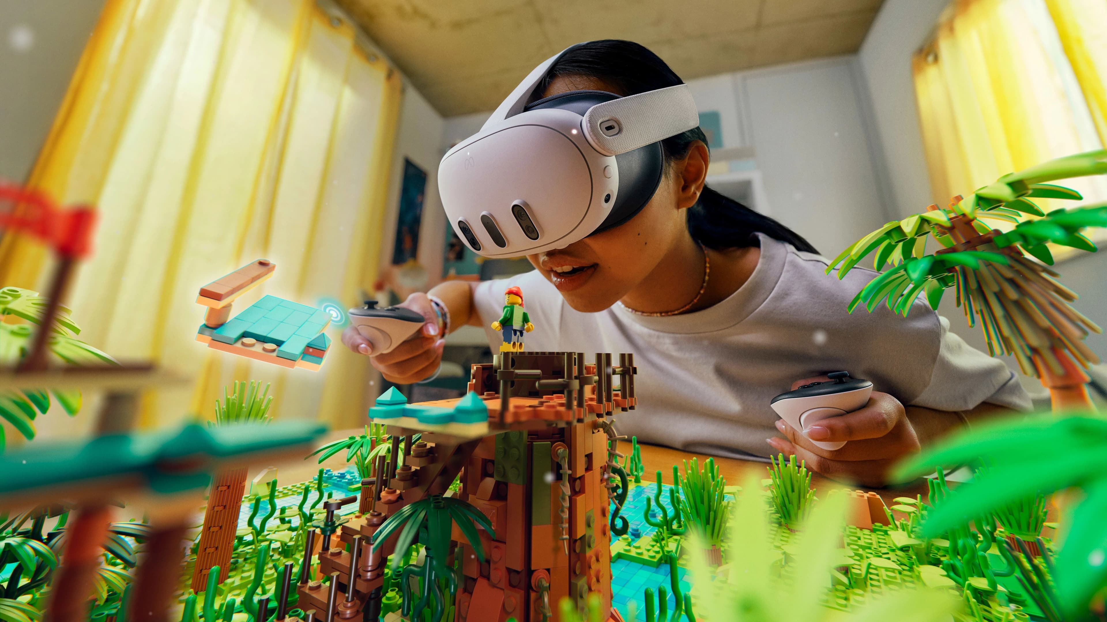 Een leerling verkent met een VR-bril een zelfgebouwde LEGO-wereld.